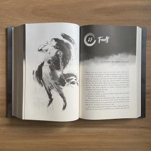 Exclusive black-and-white interior character illustration of Ylaen in SUPPLICANT by Delilah Waan.